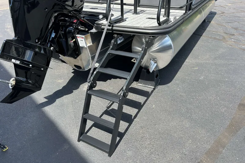 Slide: The Image of Rear view of 2027 Sylvan X3 LZ DH Tritoon with ladder and motor. - 25