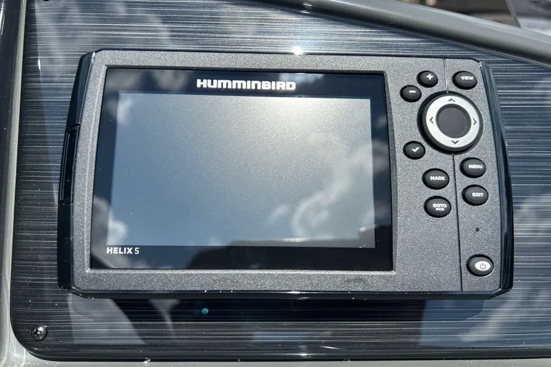 Slide: The Image of Humminbird Helix 5 fish finder on 2027 Sylvan X3 LZ DH Tritoon dashboard. - 13