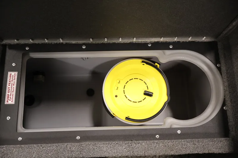 Slide: The Image of Storage compartment with yellow lid in 2025 Tracker Targa 18 WT boat. - 40