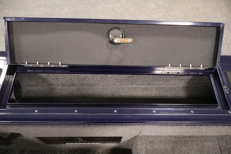 Slide: The Image of Storage compartment of 2025 Tracker Targa 18 WT boat, open and empty. - 38