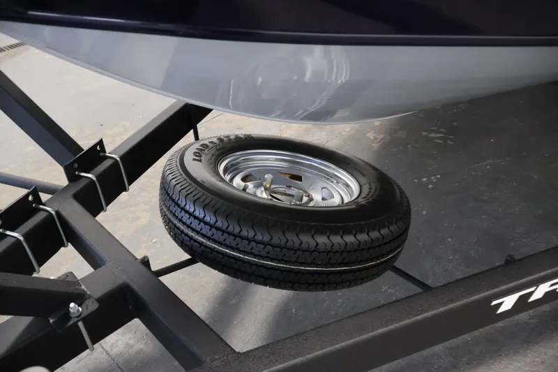 Slide: The Image of 2025 Tracker Targa 18 WT boat trailer with spare tire. - 51