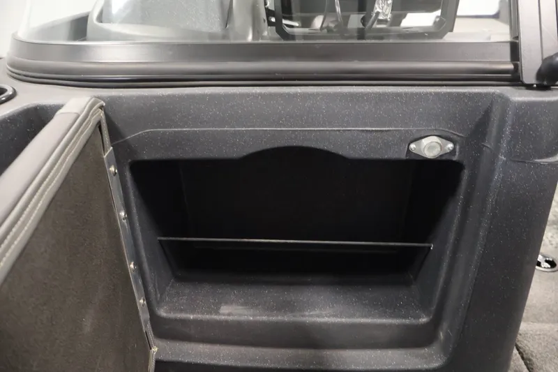 Slide: The Image of Storage compartment in 2025 Tracker Targa 18 WT boat interior. - 17