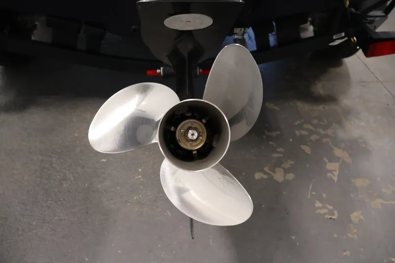Slide: The Image of Propeller of 2025 Tracker Targa 18 WT boat on concrete floor. - 48
