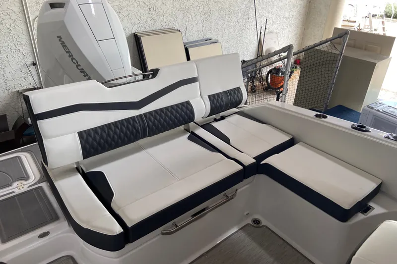Slide: The Image of Luxury seating on 2027 Monterey Elite 25 OB boat with Mercury engine. - 3