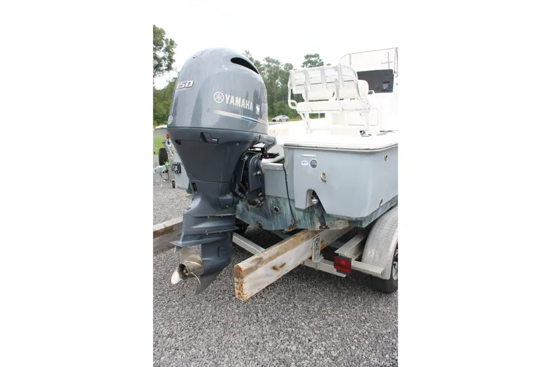 Slide: The Image of 2018 Sea Hunt BX21 boat with Yamaha 150 outboard motor on trailer. - 8