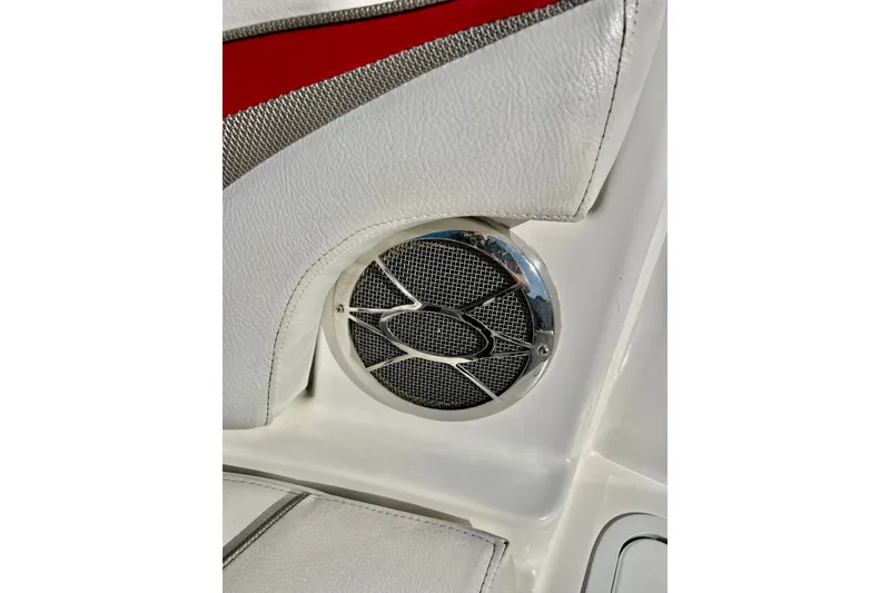 Slide: The Image of Speaker detail on 2013 Hurricane SunDeck 2200 OB boat with white and red upholstery. - 52