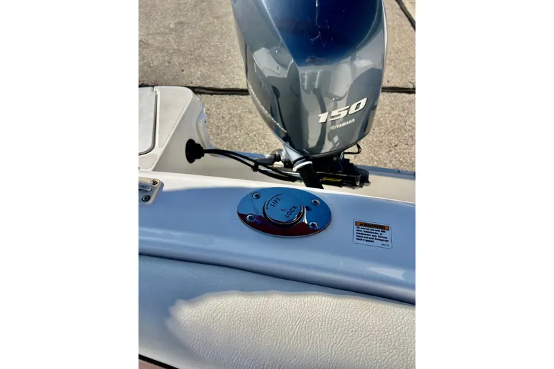Slide: The Image of 2013 Hurricane SunDeck 2200 OB boat with Yamaha 150 outboard motor. - 66