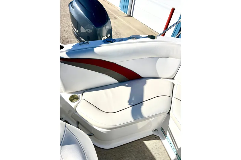Slide: The Image of 2013 Hurricane SunDeck 2200 OB boat interior with Yamaha 150 engine. - 24