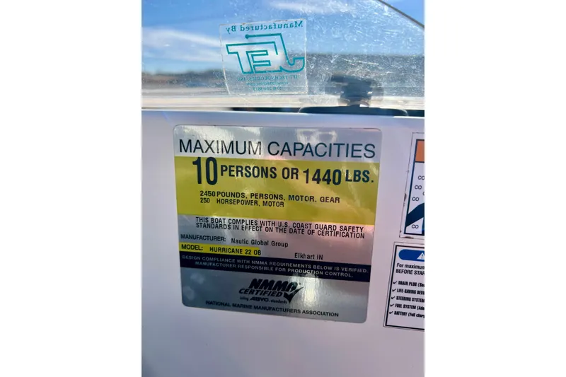 Slide: The Image of 2013 Hurricane SunDeck 2200 OB capacity label, maximum 10 persons or 1440 lbs. - 20