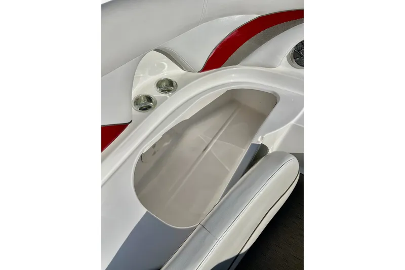 Slide: The Image of 2013 Hurricane SunDeck 2200 OB boat interior with cup holders and seating. - 50
