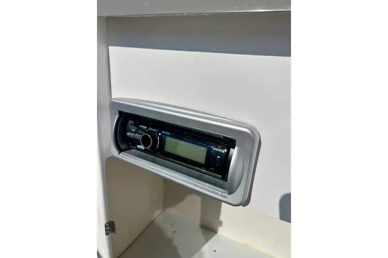 Slide: The Image of Sony stereo system in a 2013 Hurricane SunDeck 2200 OB boat console. - 34