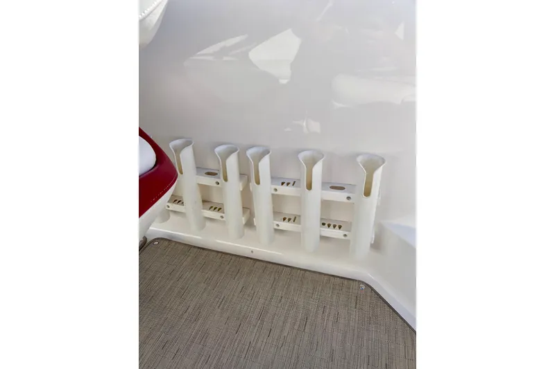 Slide: The Image of Rod holders on a 2013 Hurricane SunDeck 2200 OB boat interior. - 22