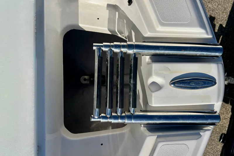 Slide: The Image of 2013 Hurricane SunDeck 2200 OB boat ladder and platform detail. - 57