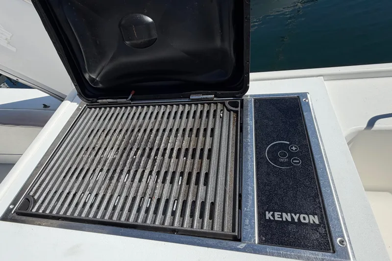 Slide: The Image of Kenyon grill on 2000 Bayliner 4788 Pilot House Motoryacht deck. - 25