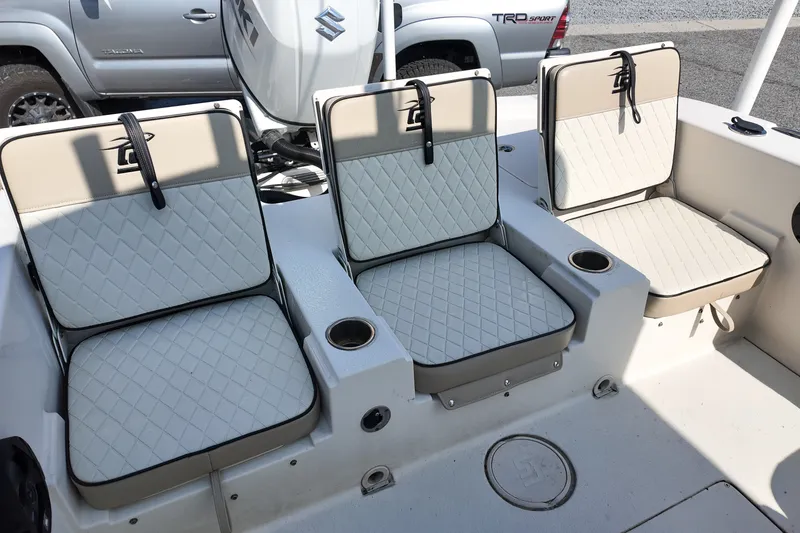 Slide: The Image of 2021 Carolina Skiff 24 Ultra Elite boat seats with diamond-pattern upholstery. - 18