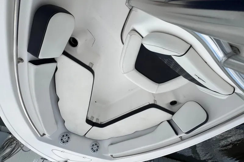 Slide: The Image of Interior seating of a 2021 Tidewater 198 CC Adventure boat, featuring cushioned seats. - 5