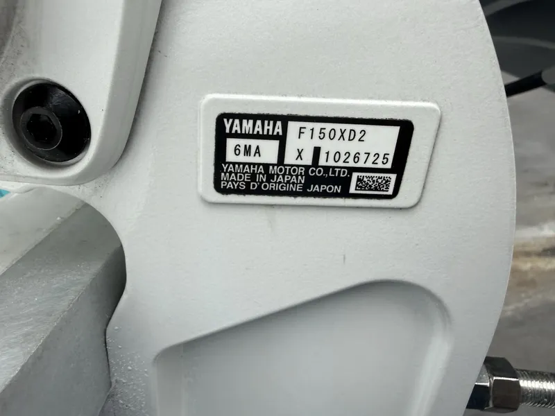 Slide: The Image of Close-up of a Yamaha motor label showing model and serial number. - 29