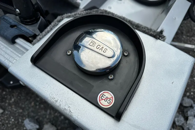 Slide: The Image of Fuel cap of 2021 Alumacraft Classic 165 CS, labeled "Gas," not for E85 use. - 24