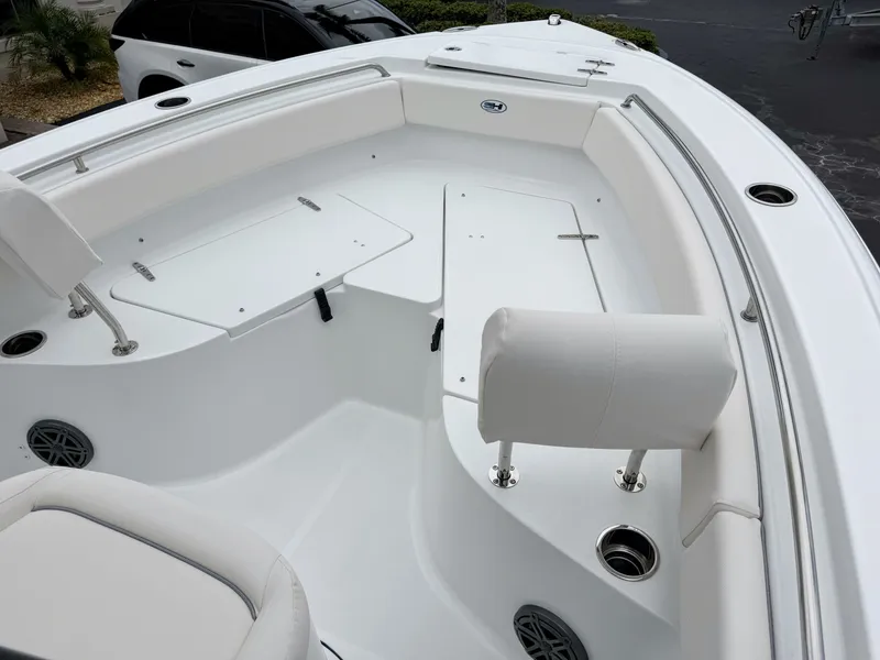 Slide: The Image of The image shows the spacious bow area of a 2027 Sea Hunt Ultra 219 boat. - 22