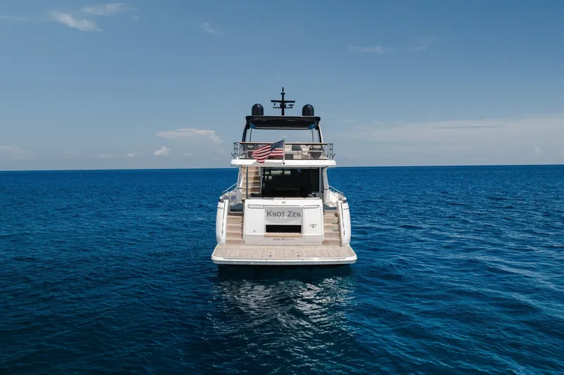 Slide: The Image of Luxury yacht Princess Y78, 2022 model, cruising on open ocean with clear blue skies. - 41