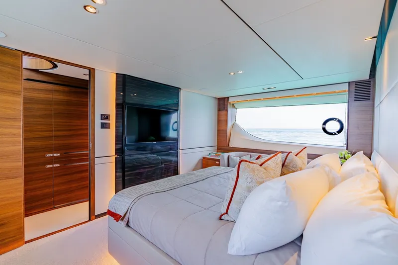 Slide: The Image of Luxurious 2022 Princess Y78 yacht bedroom with ocean view, elegant decor, and modern amenities. - 19