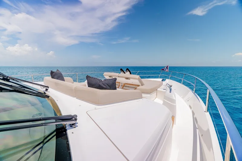 Slide: The Image of Luxurious 2022 Princess Y78 yacht deck with ocean view and plush seating. - 36