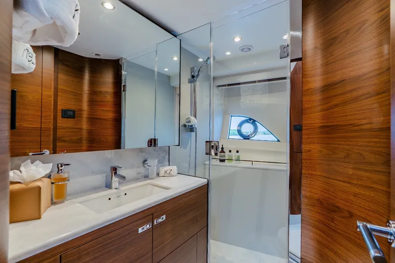 Slide: The Image of Luxurious bathroom interior on 2022 Princess Y78 yacht with wood accents and modern fixtures. - 27
