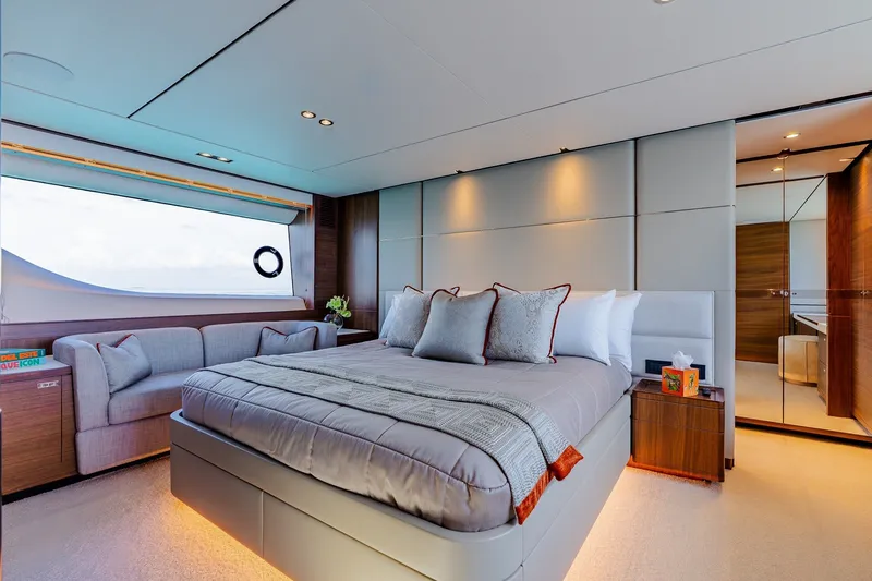 Slide: The Image of Luxurious bedroom interior on 2022 Princess Y78 yacht, featuring elegant design and modern amenities. - 18