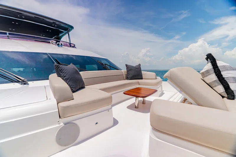 Slide: The Image of Luxurious 2022 Princess Y78 yacht deck with elegant seating and ocean view. - 37