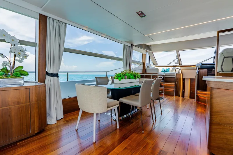 Slide: The Image of Luxurious interior of 2022 Princess Y78 yacht with elegant dining area and ocean view. - 14