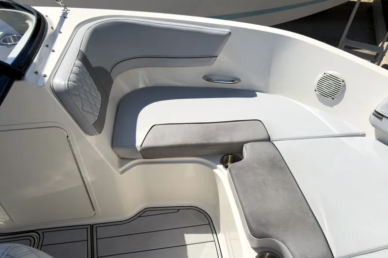 Slide: The Image of 2023 Bayliner VR5 Bowrider OB interior seating with gray and white upholstery. - 20