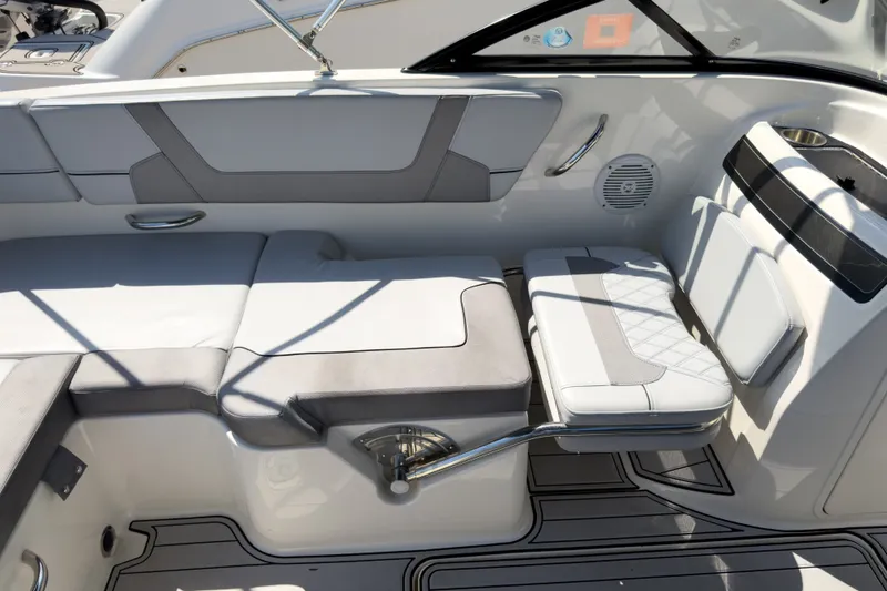 Slide: The Image of 2023 Bayliner VR5 Bowrider OB interior with cushioned seating and modern design. - 21
