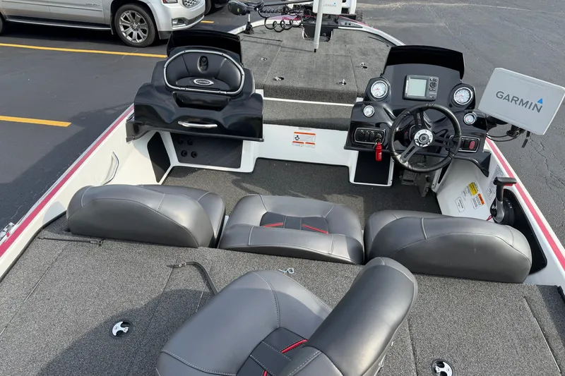 Slide: The Image of Interior of a 2016 Nitro Z18 boat with Garmin navigation system and seating. - 1