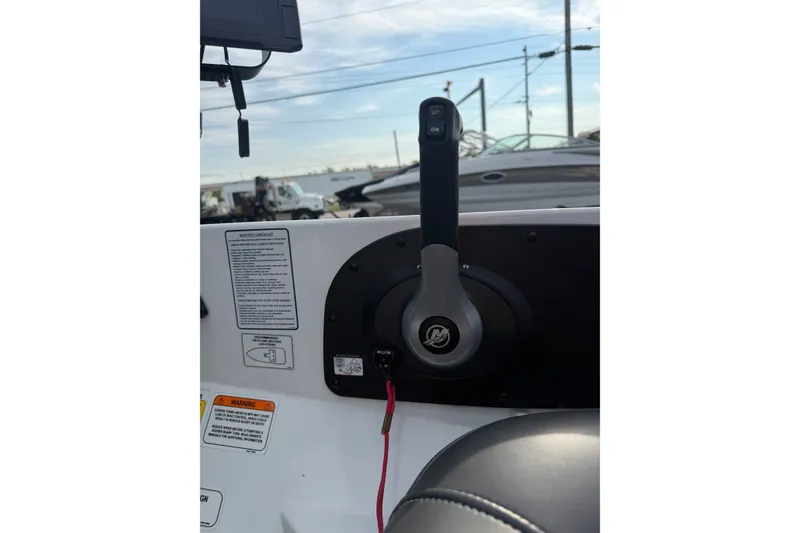 Slide: The Image of Throttle control on a 2016 Nitro Z18 boat, featuring warning labels and control buttons. - 22