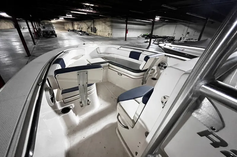 Slide: The Image of 2020 Robalo R200 Center Console boat interior in a storage facility. - 13