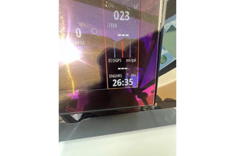 Slide: The Image of Dashboard display of a 2022 Sea Ray SPX 210 boat showing engine hours. - 38