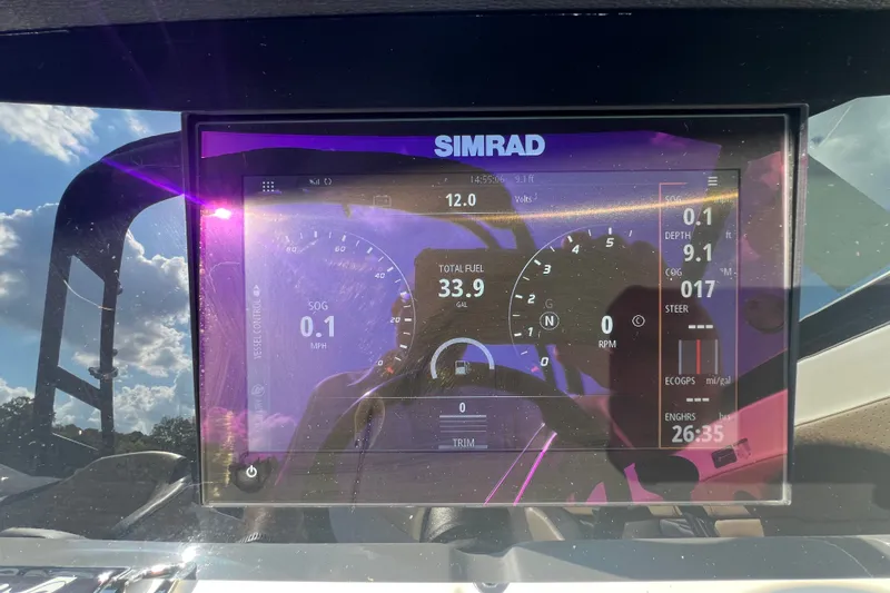Slide: The Image of Simrad display on 2022 Sea Ray SPX 210 boat showing navigation and engine data. - 37