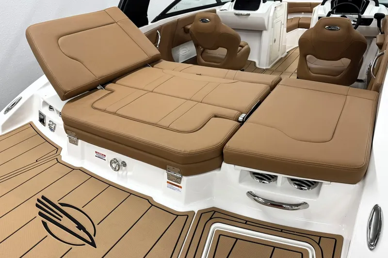 Slide: The Image of 2027 Chaparral 21 SSi boat interior with tan leather seating and sleek design. - 7