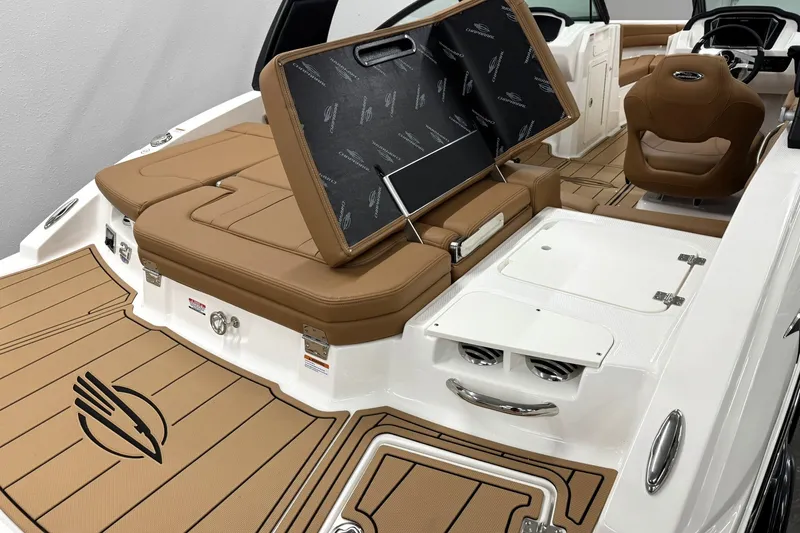 Slide: The Image of 2027 Chaparral 21 SSi boat interior with tan seating and storage compartments. - 5