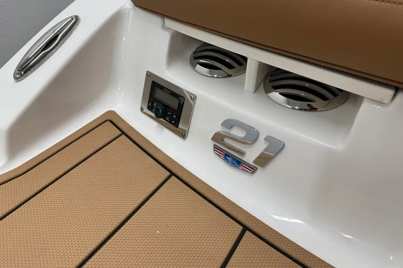 Slide: The Image of 2027 Chaparral 21 SSi boat interior with speakers and control panel. - 8