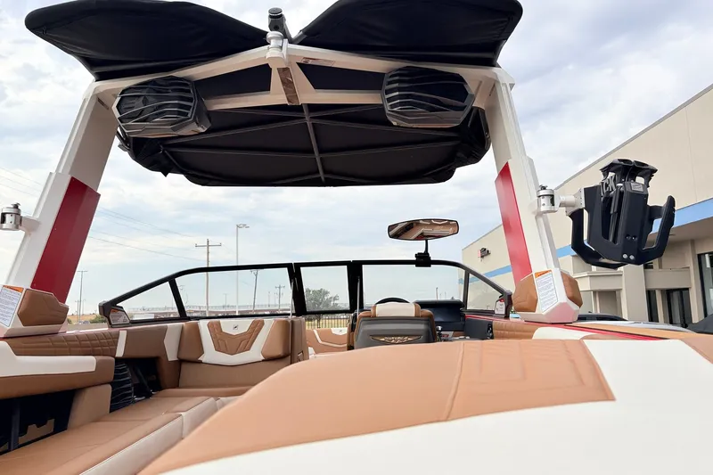 Slide: The Image of 2022 Nautique Super Air Nautique G25 interior with premium seating and advanced sound system. - 53
