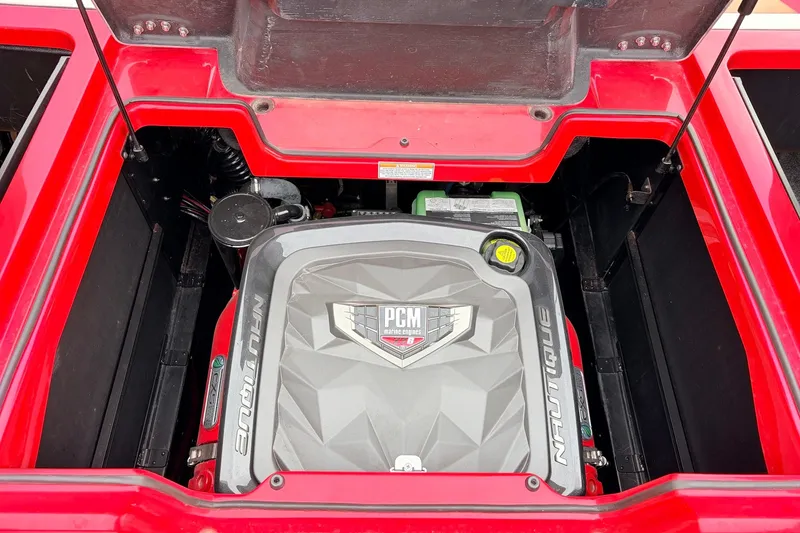 Slide: The Image of Engine compartment of 2022 Nautique Super Air Nautique G25 boat, featuring PCM engine. - 51