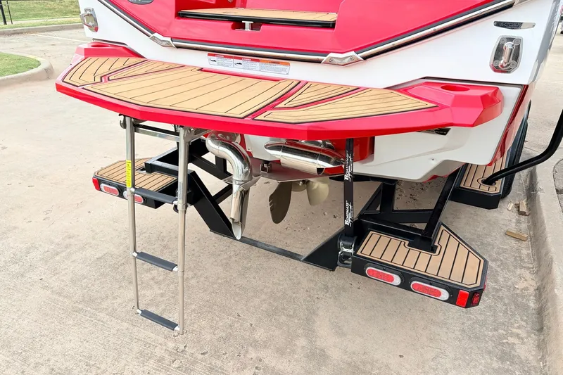 Slide: The Image of 2022 Nautique Super Air Nautique G25 boat with swim platform and ladder. - 8