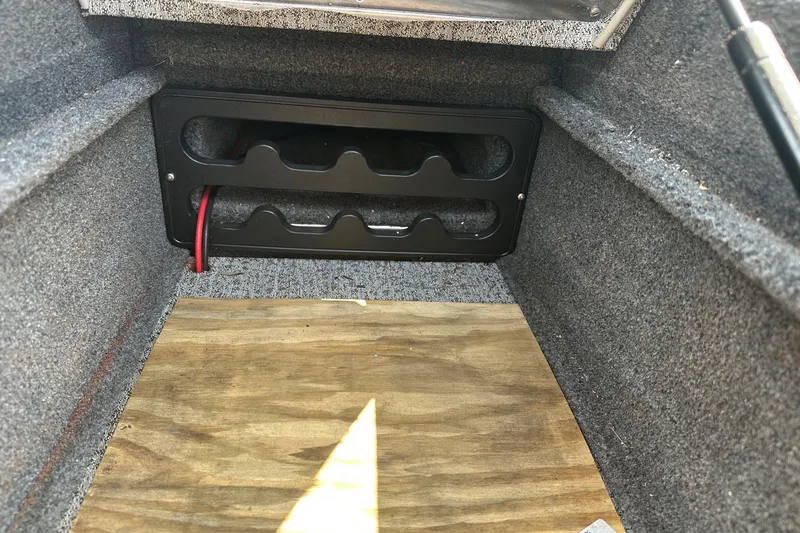 Slide: The Image of Interior of a 2021 Bass Tracker Pro 16 boat showing storage compartment. - 20