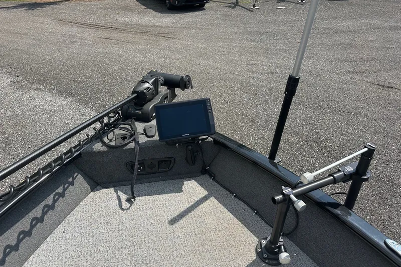 Slide: The Image of 2021 Bass Tracker Pro 16 boat with mounted electronics and fishing equipment. - 15