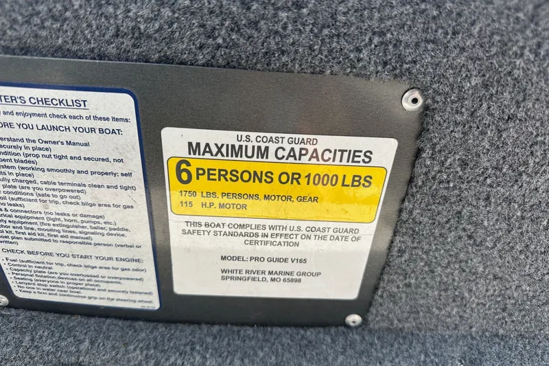 Slide: The Image of Bass Tracker Pro 16 boat capacity label, 6 persons or 1000 lbs, 2021 model. - 33