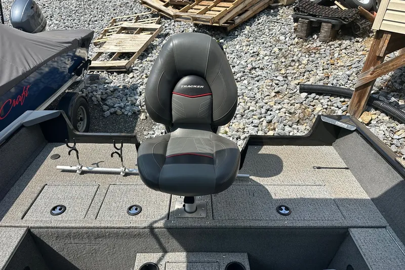 Slide: The Image of 2021 Bass Tracker Pro 16 boat seat on gravel background. - 29