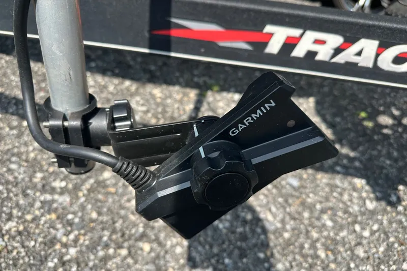 Slide: The Image of Garmin device mounted on a 2021 Bass Tracker Pro 16 boat trailer. - 14