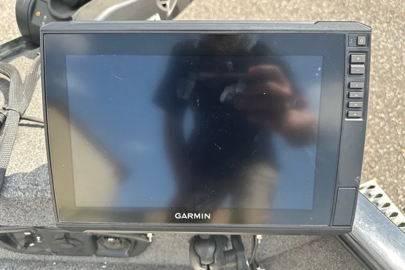 Slide: The Image of Garmin fishfinder on 2021 Bass Tracker Pro 16 boat dashboard. - 16