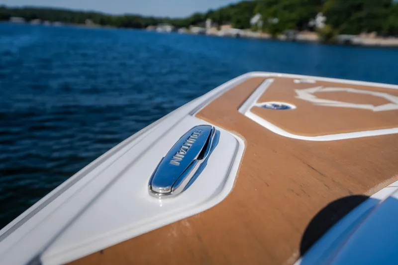 Slide: The Image of 2026 Fountain 39 DX boat deck with chrome detailing on a sunny day. - 67